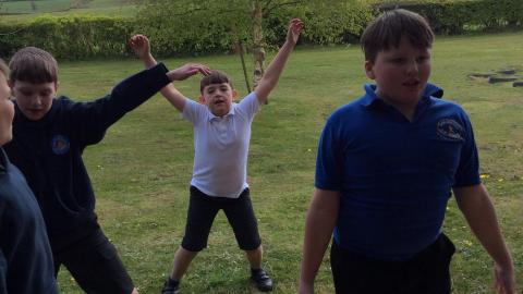 Willow class pupils doing star jumps