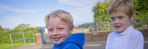 Child Playing on tricycle