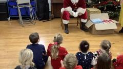 Santa talking to the children 