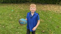 Holding a rugby ball correctly 