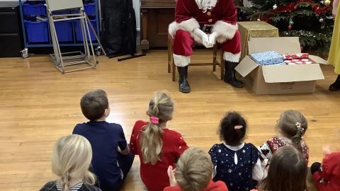 Santa talking to the children 