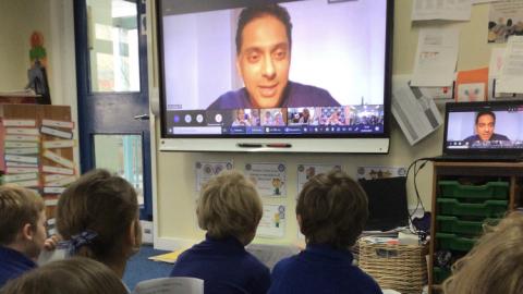 Children talking part in an online discussion