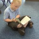 Boy reading a book 