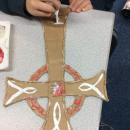 A willow class pupil using ova glue to create a raised pattern 
