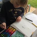 Girl using watercolours