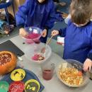 children mixing jelly, pretending it is a potion