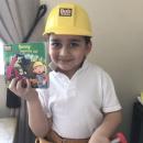 Boy dressed as a builder