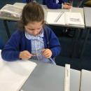 Emily exploring how a flicked ruler vibtates