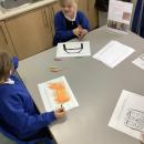 Girls drawing the great fire of London 
