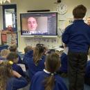 Boy asking question to pilot on the screen