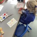 Children printing with paint