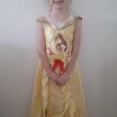 A child dressed as Belle