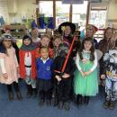 A picture of children dressed up in costumes