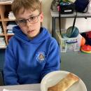 Pupil with their baked spring roll